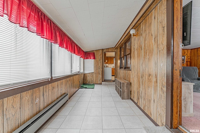 sunroom / solarium with a baseboard radiator