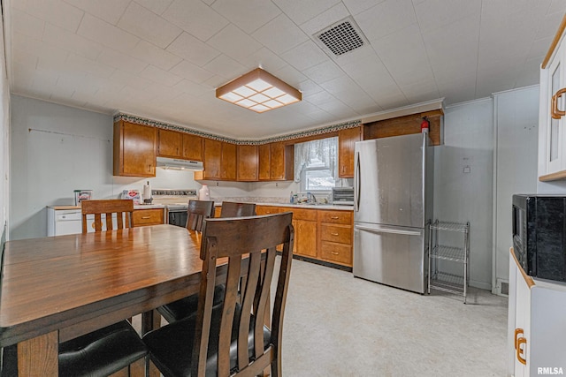 kitchen with stainless steel refrigerator