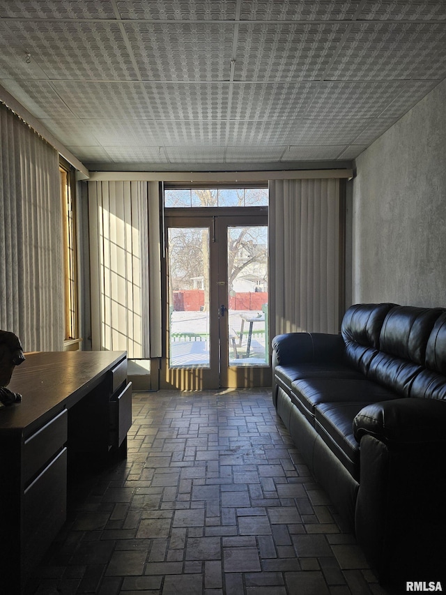 sunroom featuring french doors