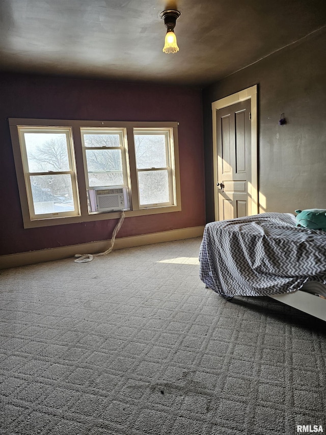 bedroom featuring cooling unit and carpet floors