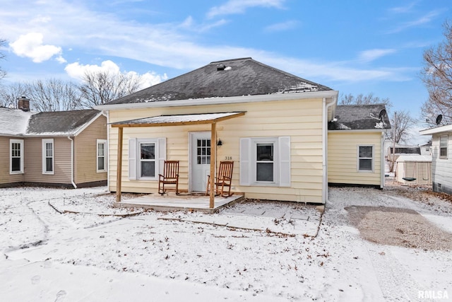 view of snow covered property