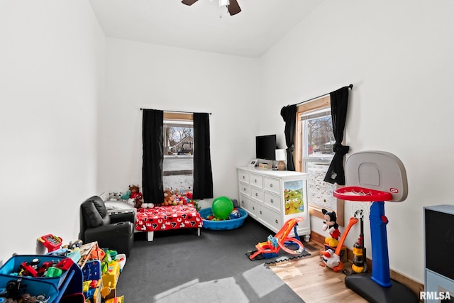 game room with ceiling fan and hardwood / wood-style floors