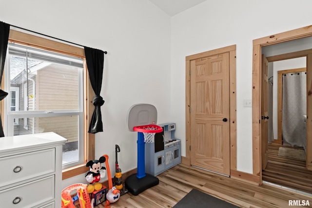 game room featuring light hardwood / wood-style flooring