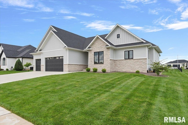 view of front of home featuring board and batten siding, driveway, a front lawn, an attached garage, and stone siding