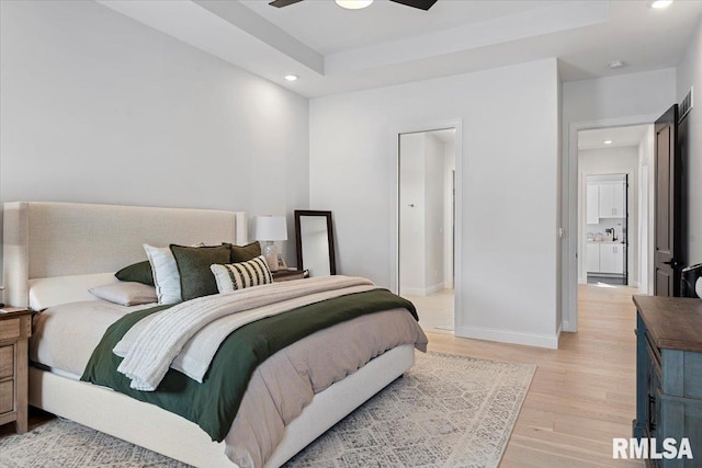 bedroom featuring light wood-type flooring, recessed lighting, baseboards, and a ceiling fan