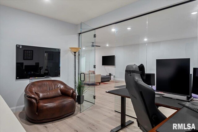 office space featuring baseboards, a ceiling fan, recessed lighting, and wood finished floors
