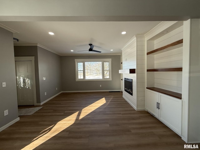 unfurnished living room with a fireplace, recessed lighting, ornamental molding, and baseboards