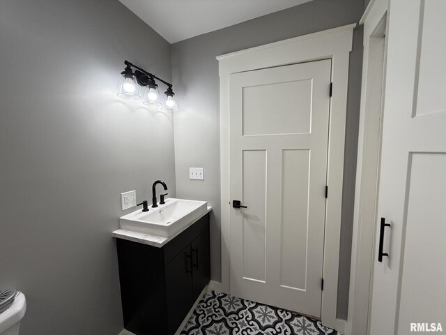 bathroom with a shower stall, baseboards, and wood finished floors