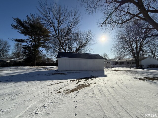 view of yard covered in snow