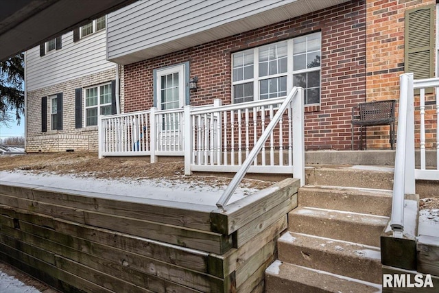 view of snow covered deck