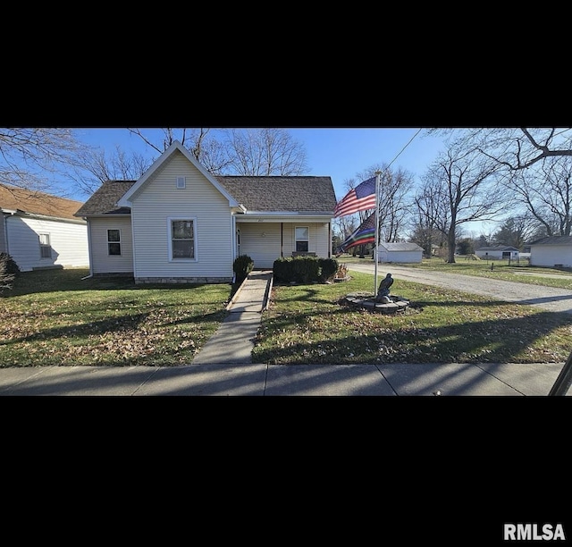 view of front of home with a front yard