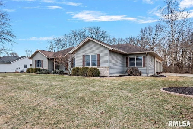 ranch-style house with a garage and a front yard