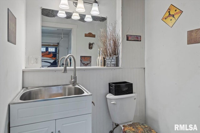 bathroom featuring a sink and toilet