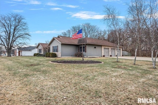 exterior space with a garage and a lawn