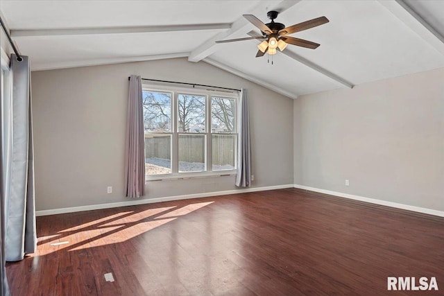 interior space featuring dark wood-style floors, ceiling fan, lofted ceiling with beams, and baseboards