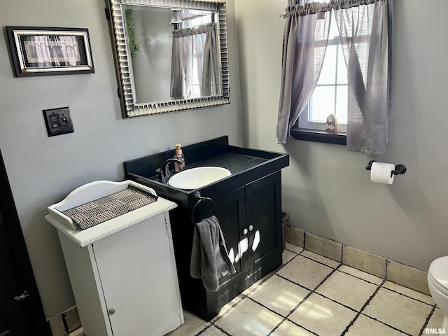 102 W Lorton St, Roodhouse, IL 62082 - bathroom featuring toilet and vanity