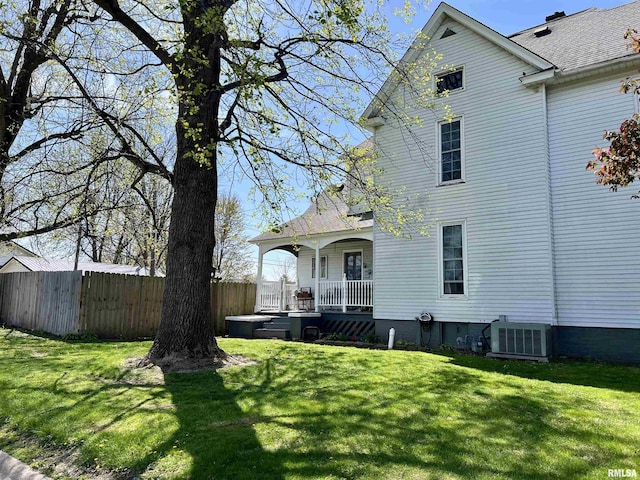 102 W Lorton St, Roodhouse, IL 62082 - rear view of property featuring a porch and cooling unit