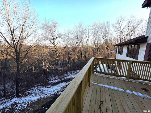 view of snow covered deck