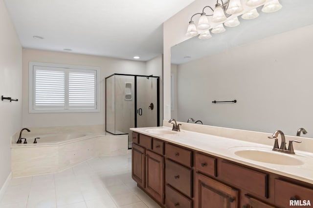 full bathroom featuring a stall shower, a garden tub, a sink, and double vanity