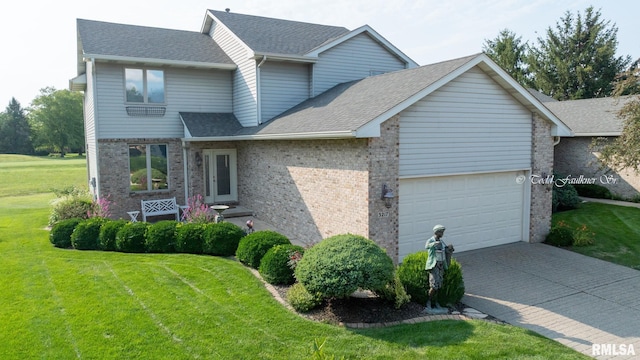 view of front facade with a shingled roof, an attached garage, brick siding, and a front yard