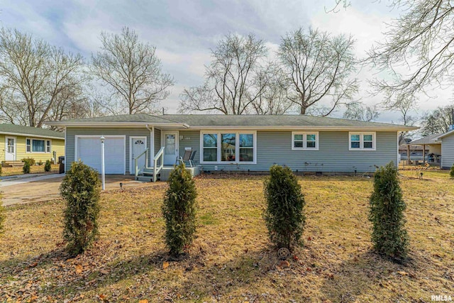 single story home featuring a garage, crawl space, and concrete driveway