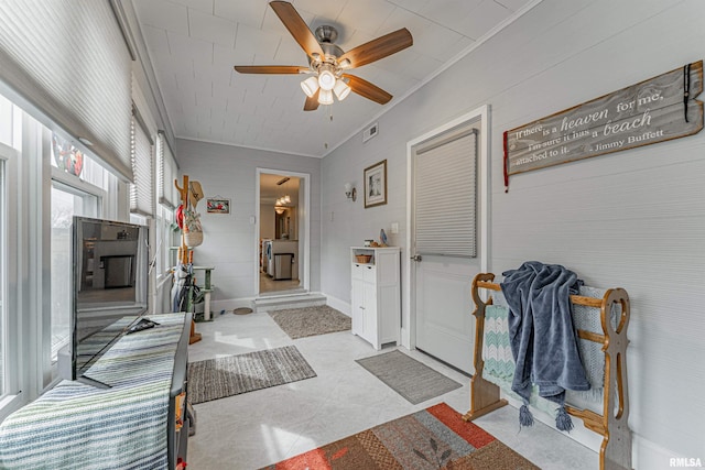 interior space featuring light tile patterned floors, baseboards, and visible vents