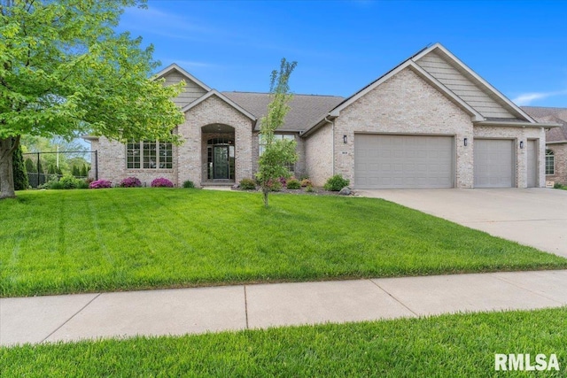 ranch-style home featuring a front lawn, fence, brick siding, concrete driveway, and an attached garage