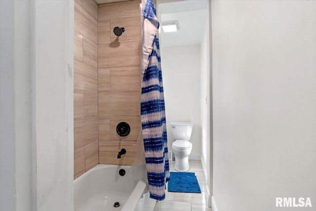 full bathroom featuring shower / tub combo and toilet