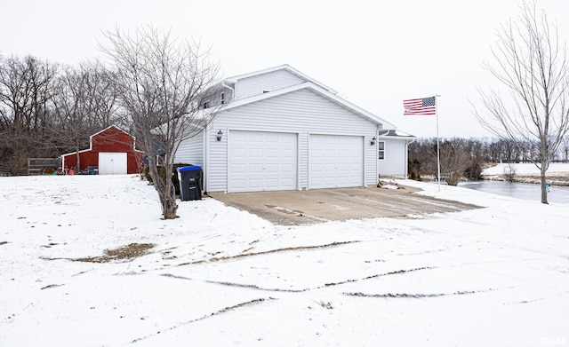 view of snow covered garage