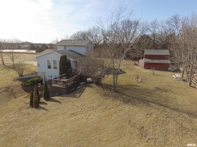 exterior space with a deck and a rural view