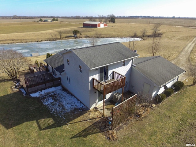 birds eye view of property with a rural view