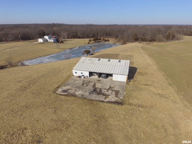 bird's eye view with a water view and a rural view