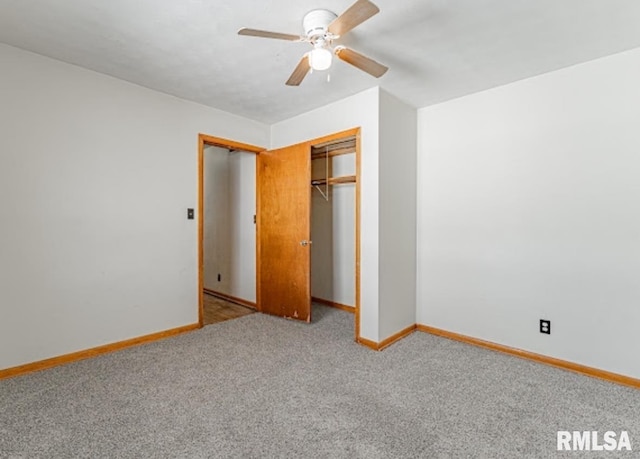 unfurnished bedroom featuring a ceiling fan, carpet, a closet, and baseboards