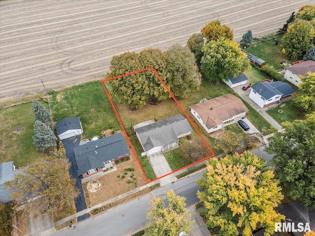 birds eye view of property with a residential view