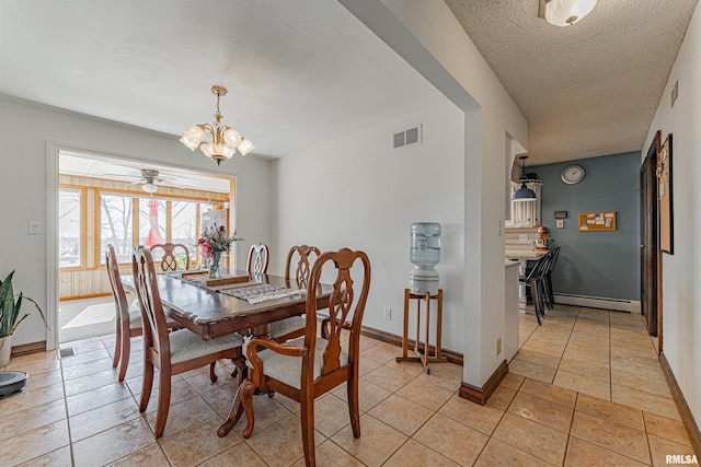 dining space with light tile patterned floors, visible vents, a textured ceiling, a baseboard heating unit, and a notable chandelier