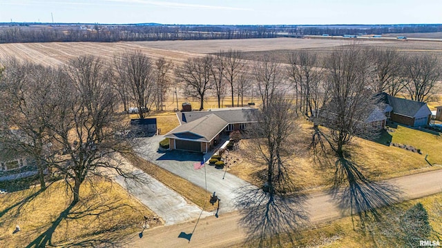 birds eye view of property with a rural view