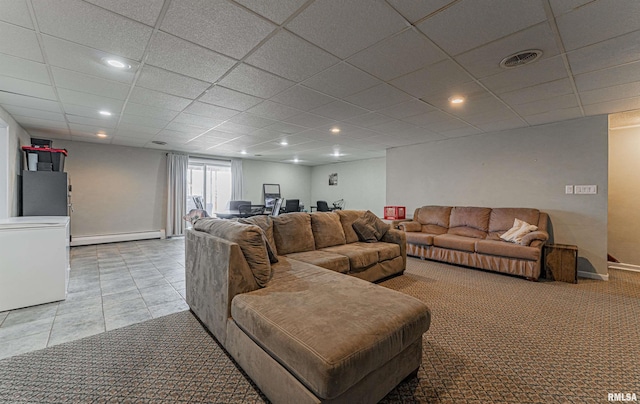 living area with a paneled ceiling, recessed lighting, light carpet, visible vents, and baseboard heating