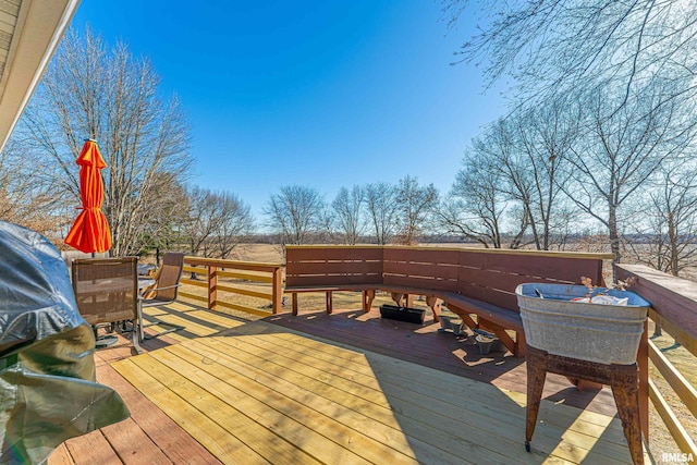 wooden deck with outdoor dining area