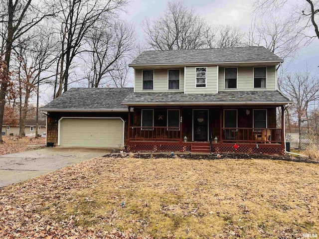 view of front of property with a garage, concrete driveway, a porch, and roof with shingles