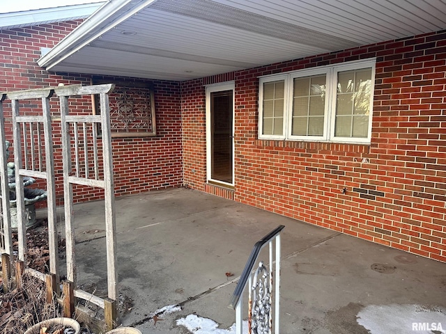 view of patio featuring a carport