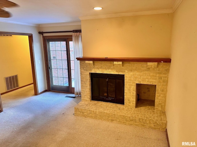 unfurnished living room with carpet floors, baseboards, visible vents, and crown molding