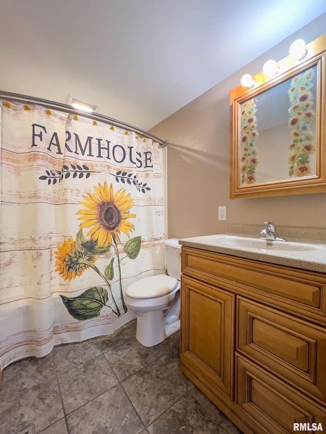 full bathroom with toilet, a shower with curtain, and vanity