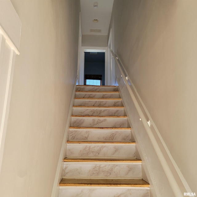 staircase with visible vents