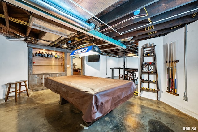 game room with pool table and unfinished concrete floors