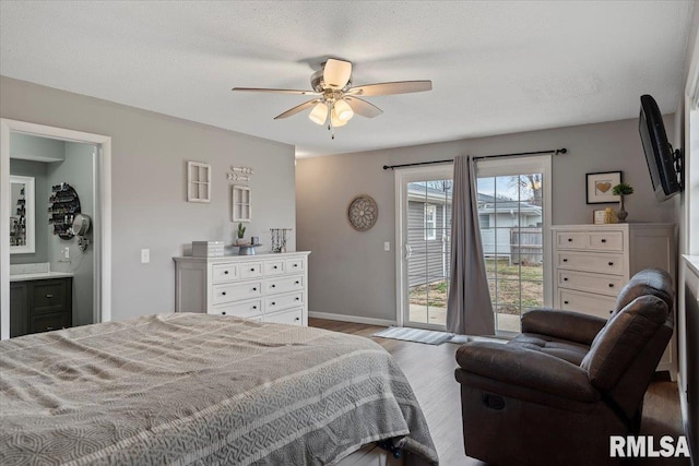 bedroom with ceiling fan, baseboards, wood finished floors, and access to exterior