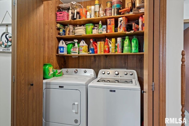 washroom featuring laundry area and washing machine and clothes dryer