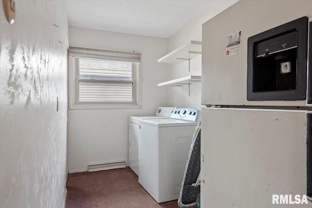 clothes washing area with carpet, laundry area, and washer and clothes dryer