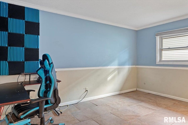 office space featuring baseboards, ornamental molding, and a textured ceiling