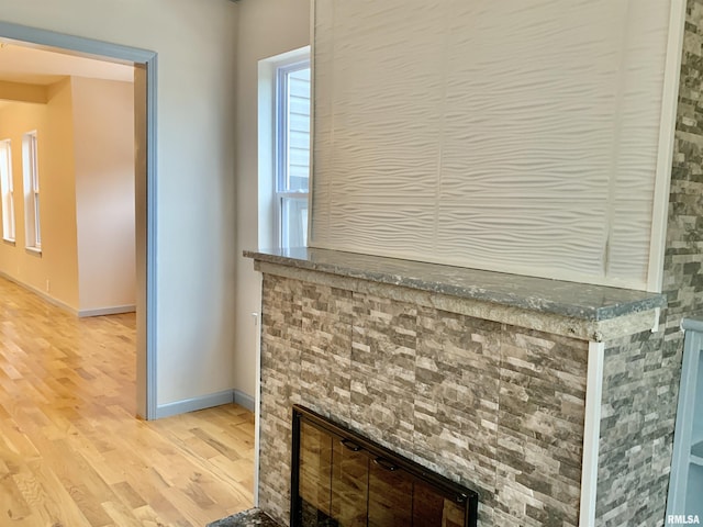 interior details with wood finished floors and baseboards