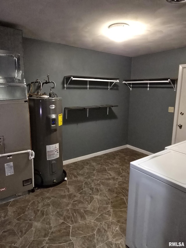 interior space featuring heating unit, washer / dryer, and water heater